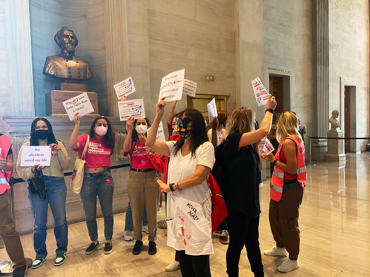 Vivian_E_Jones's tweet photo. A group of protesters organized by Planned Parenthood has marched around the Capitol and are now protesting just outside the Senate chamber. https://t.co/UkzADBt2GB