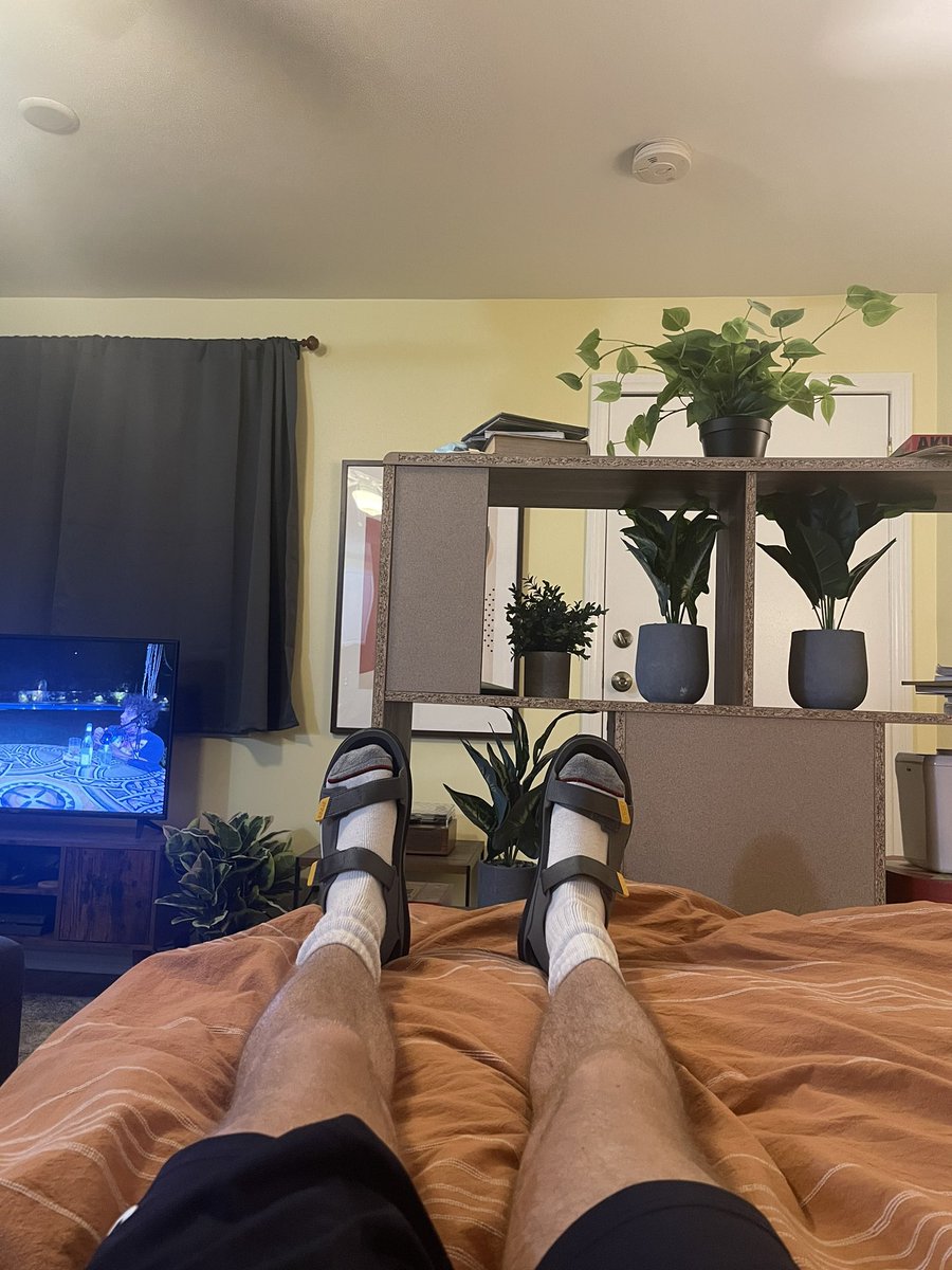 sandals in bed?? gross! well think again. these are brand new. never worn outside. a gentle reminder to never be quick to judge