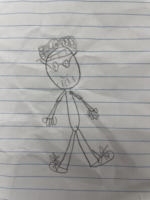 a drawing of me by a kid at work and a drawing of me by me. 