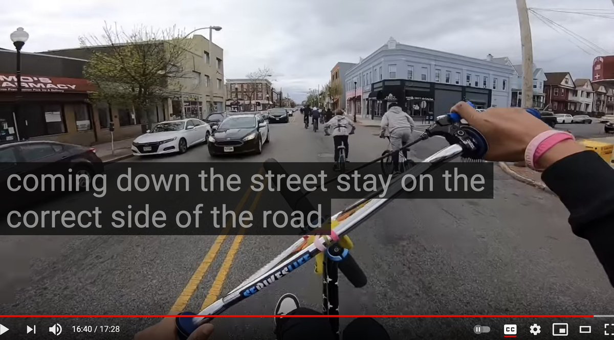 She insists it is for their safety and that they need to stay on the correct side of the road. Kudos to Christian Orozco's editing skills here...he drops in a shot of them riding on the correct side of the road.