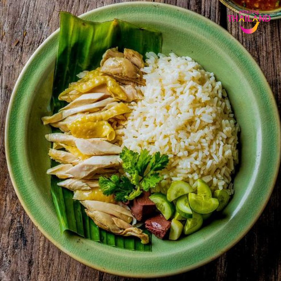 A quick stroll down Bangkok streets and you’d definitely find Thai-style chicken rice called Khao Man Gai! 
This simple chicken dish mildly seasoned is served with garlic-infused Jasmine rice, soup, and a key side dish! Drooling yet? 

Thailand is now open for travel!