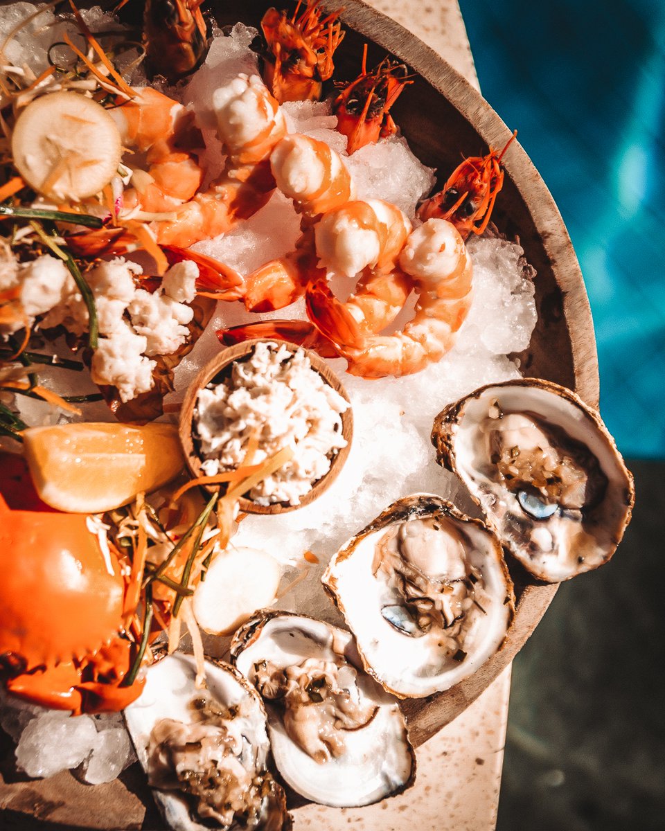 Freshly served seafood platter - a great accompaniment for your poolside lounging.