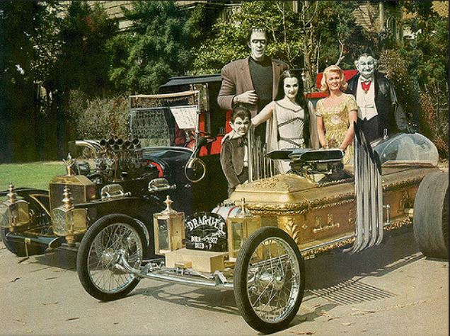 This Drag-U-La looks nothing like the Munster Koach or Rob Zombie's Dragula. It's an entirely different car. In it, Grandpa gets behind the wheel and wins back the Munster Koach. (12/21)