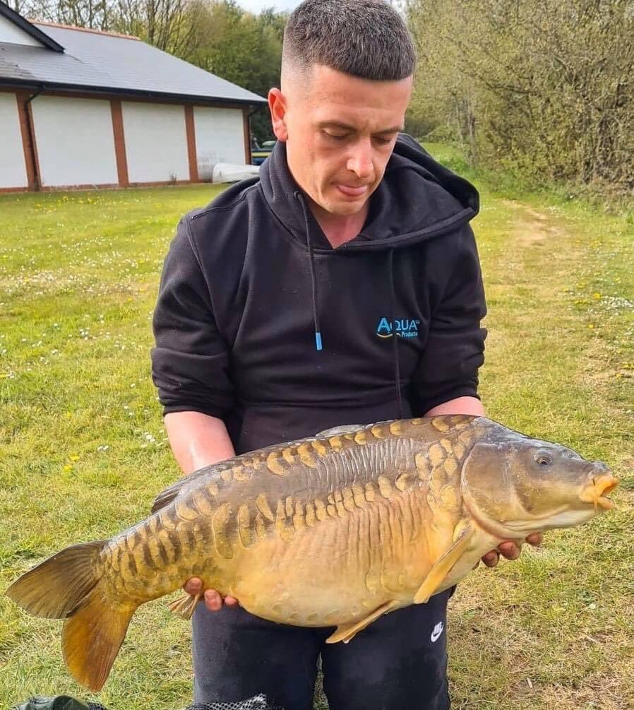 Joseph really enjoying his session at Mably lodge lake fishing the Pro Baits Uk Squid Orange.