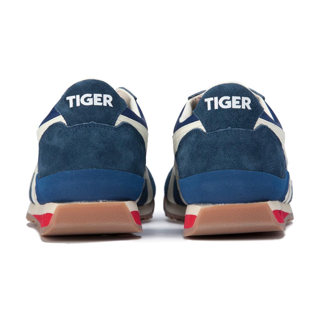 OnitsukaTigerUS's tweet photo. The ULTIMATE 81® NM style is the modern luxury incarnation of our archetypal running style, the ULTIMATE 81® model. Now available online and in-store. #ULTIMATE81 #NIPPONMADE #OnituskaTiger https://t.co/m9wvRgQOZp https://t.co/J8mEhZHX2r