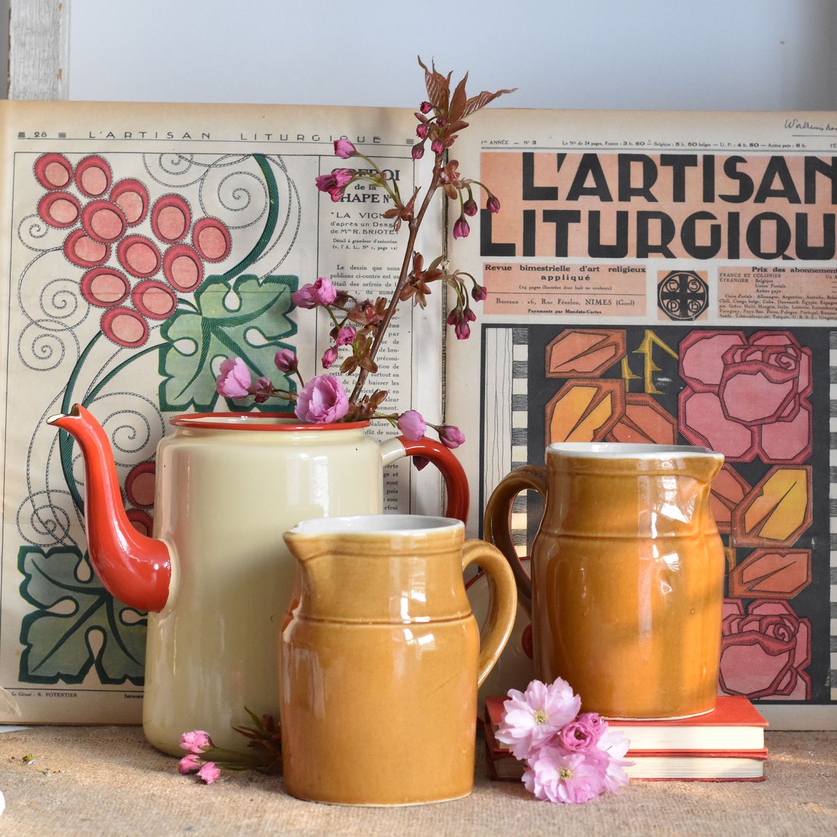 A little collection of vintage French glazed stoneware from the Manufacture de Digoin and a cream &amp; red enamel pot; all perfect for showing off beautiful Spring blossom or other seasonal blooms. These pieces are available to purchase from our website (link in bio) #virtualvintage