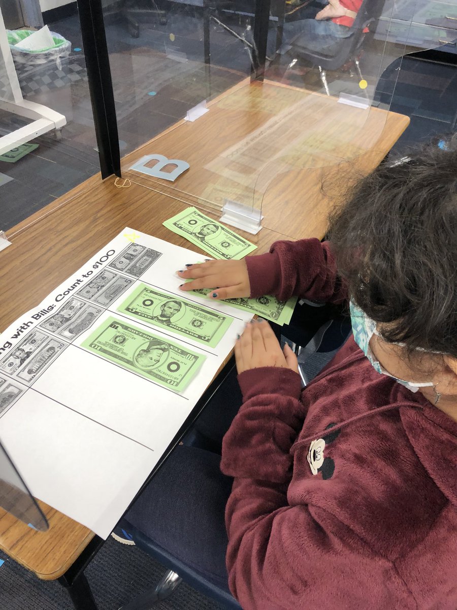 Mrs. McMichael’s class had a great time with their UCI math unit on money today! This unit supports major work of addition and subtraction in Grade 2 as students add or subtract bills.