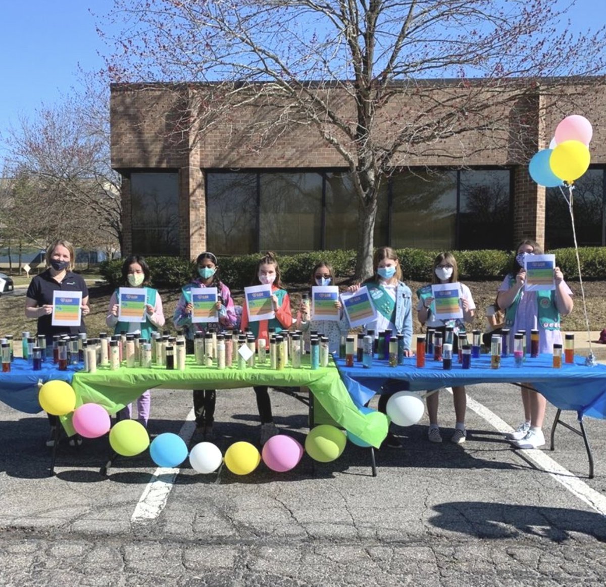 AutismSociety's tweet photo. @girlscouts Troop #744 from Elkridge, MD proudly displayed their #AutismAcceptanceMonth signs during the distribution of their Sensory Friendly Bottles to kick off the celebration. https://t.co/ONRdY0jtg6 #CelebrateDifferences #HoCoAutism #AutismStrongMD https://t.co/041k8WU2yX