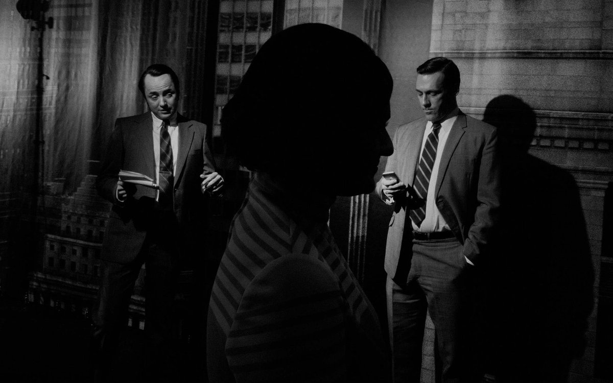madmenpics's tweet photo. Don Draper holding an iPhone #disturbing https://t.co/pyeZQyKOAv