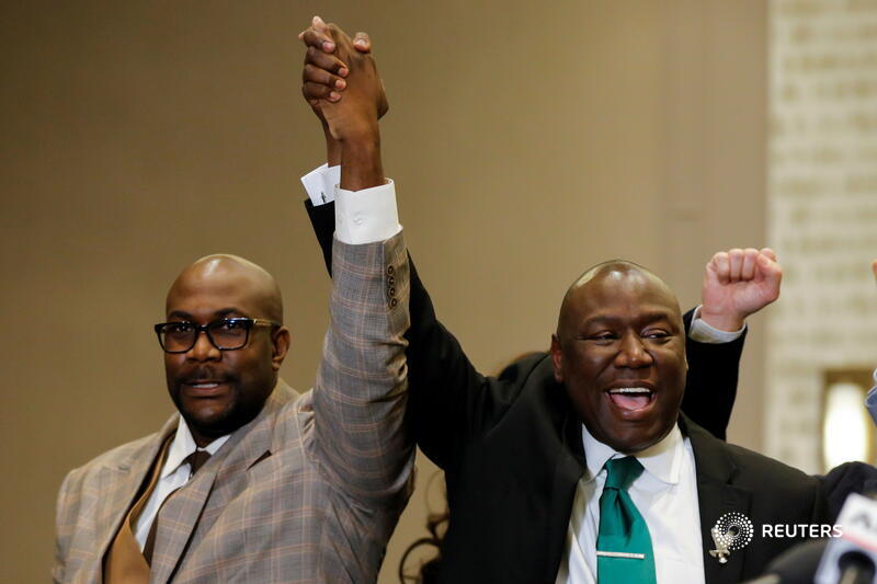 George Floyd's brother Philonise and Ben Crump, the Floyd family attorney, raise their fists during a news conference. 'Justice for Black America is justice for all of America,' Crump said in a statement. More photos:  https://reut.rs/3dwMNf8    @npfosi