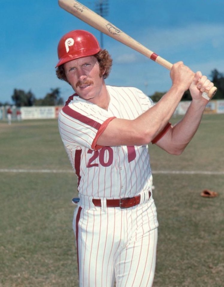 Super70sSports's tweet photo. "Hey, Schmidt, I bet you can't hit 40 dingers this year with a woman's hairdo and a nacho helmet." 

"Challenge accepted." https://t.co/F1sGrAEsNo