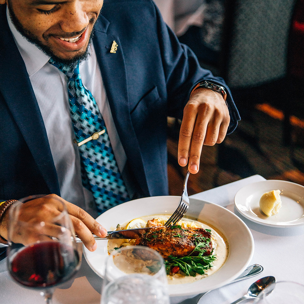 Oven-baked salmon with lemon orzo, sun-dried tomatoes, and a side of incredible city views. Anyone else hungry?! #Foodies #FoodGoals
