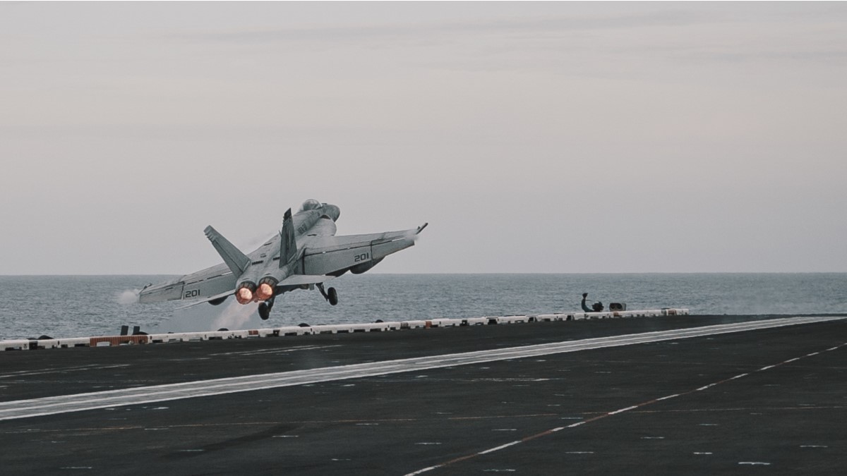 USPacificFleet's tweet photo. An F/A-18E Super Hornet, assigned to #VFA31 and an E-2C Hawkeye, assigned to #VAW115, launch from the flight deck of the aircraft carrier #USSTheodoreRoosevelt during recent operations in the @US7thFleet . #FlyNavy #CVN71 https://t.co/Ur2S5SklWU