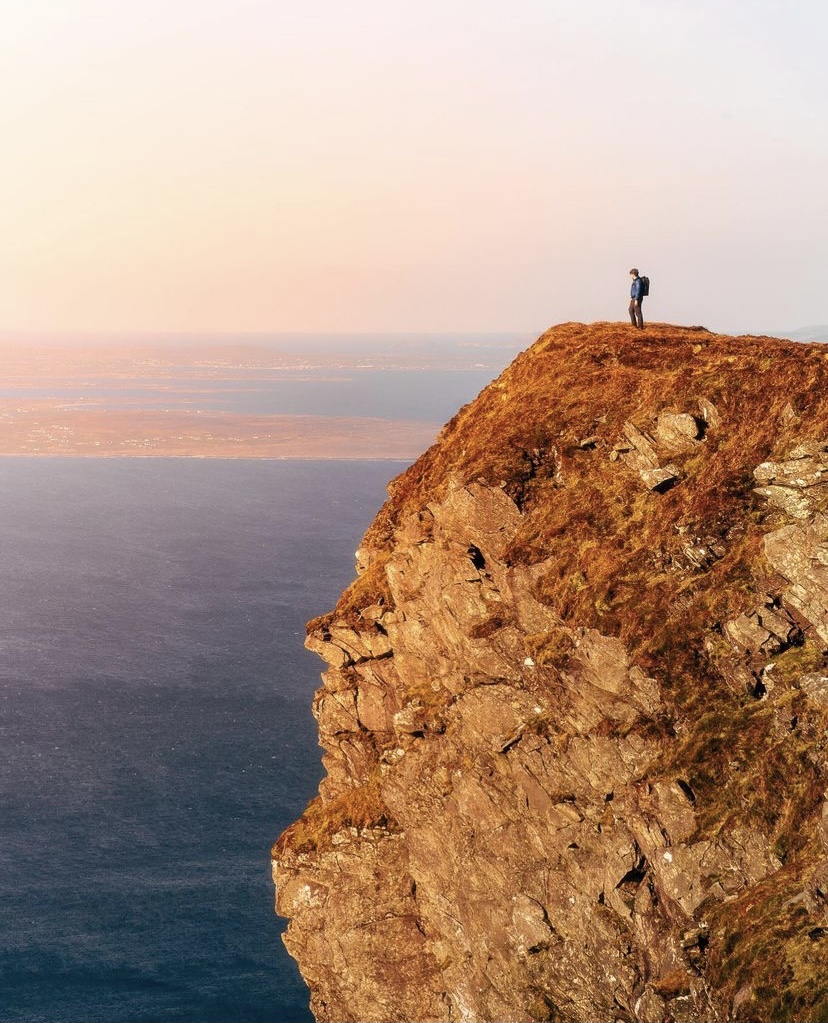 Standing at the edge of Ireland Achill Island, County Mayo Photo Instagram thegerduffy