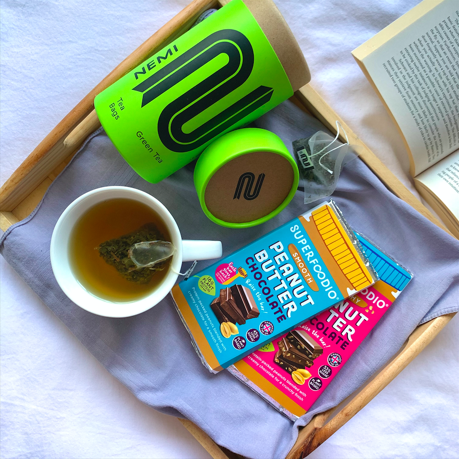 superfoodio's tweet photo. It’s #NationalTeaDay 🫖 Find us with our #PeanutButterChocolate Bars in one hand &amp; a cup of @nemiteas in the other!🍫☕️@nemiteas are a #socialenterprise making plastic free, organic &amp; fair trade #tea🌱 Empowering people &amp; the planet? That’s our cup of tea😎https://t.co/wEpP75SHKA https://t.co/o9N2T5E4RA