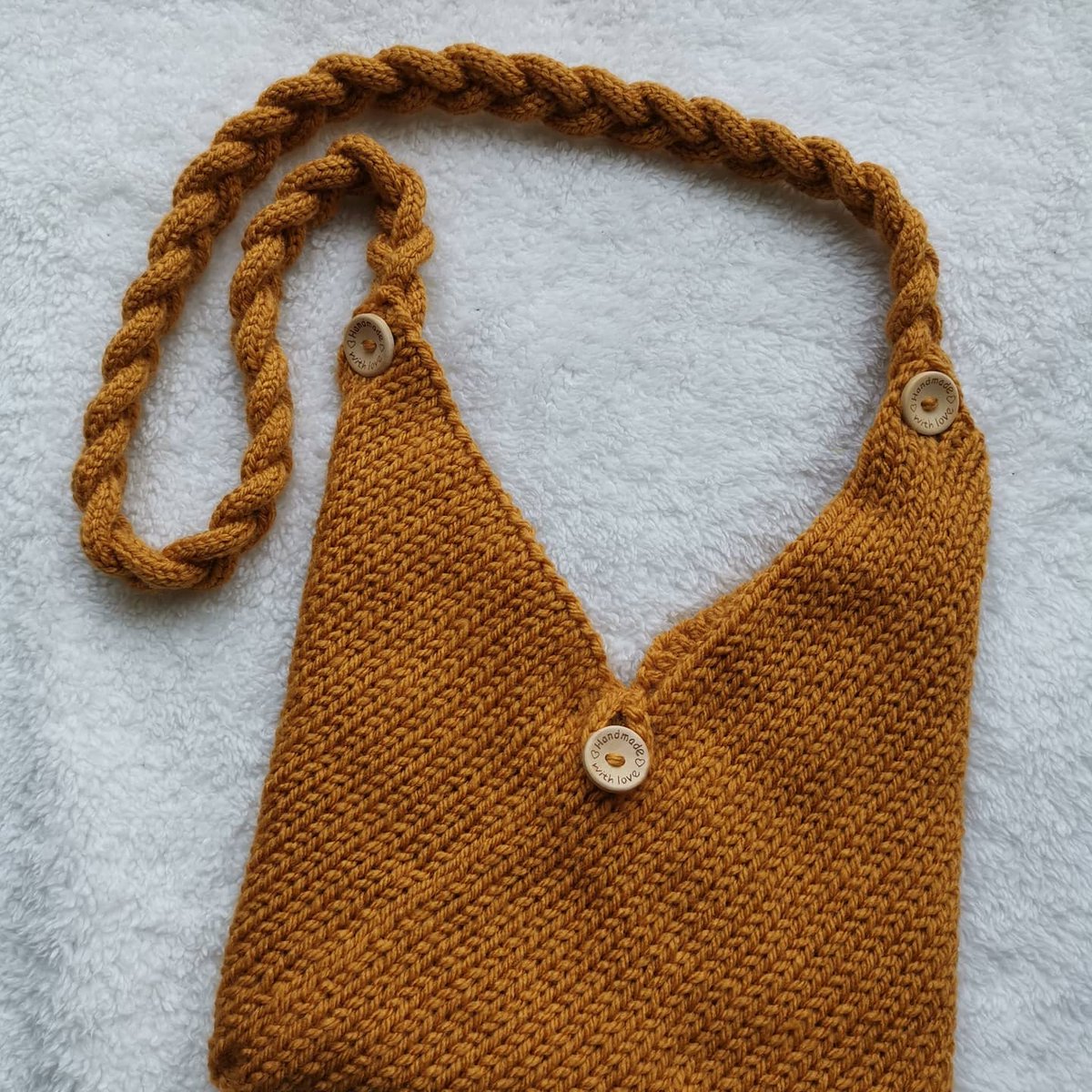 Daisy23547498's tweet photo. Finished another bag, gold/mustard colour with plaited icord strap .. think I'm in love 
#handmade
#stylecraftyarn
#woolful
#hippie
#boho
#festival https://t.co/lvuUty56xY