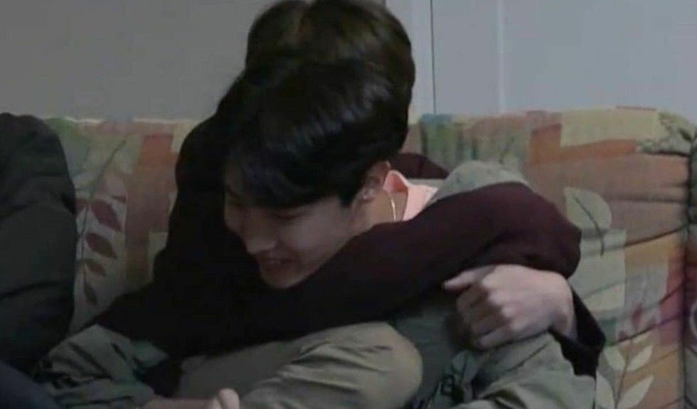 It's so cute how jungkook acts like a giant puppy when he's around hobi and takes every chance to cuddle with him .