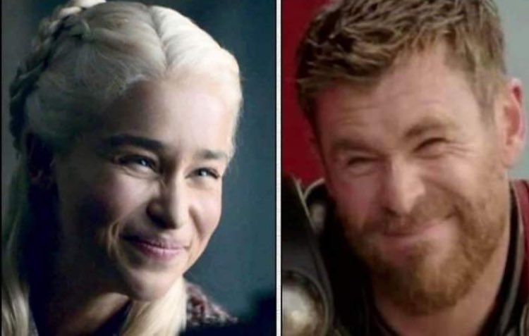 Random kids playing in park. Their parents to each other.