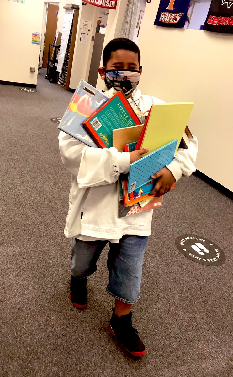 Free books!!? Yay!! This sweet boy was super excited to be taking home some free books to add to his at home library thanks to @OdomESLibrary. He even carefully chose several for his little sister. Love my @OdomEagles!