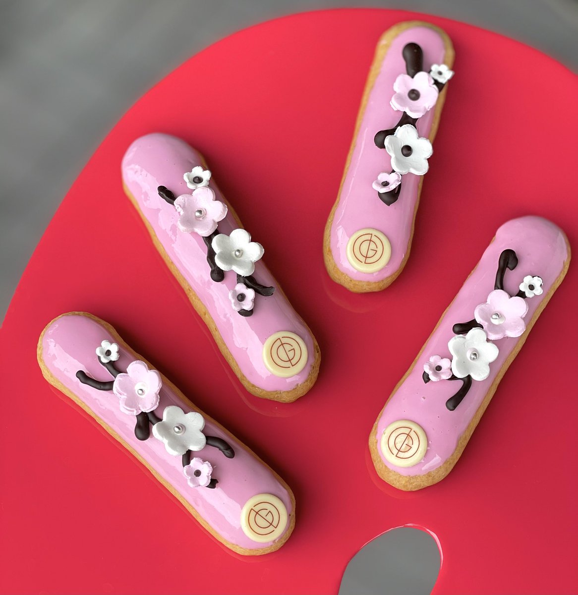 nugateau's tweet photo. It’s #CherryBlossom season in #Toronto, that means it’s time for some #SAKURA Treats!! We r thrilled to bring back #Éclair SAKURA With Whipped #Opalys Ganache scented & Japanese #sakura & Chocolate Flowers, she is not only #gorgeous but irresistible too https://t.co/Wxi8Kt7RDf https://t.co/y52nc0AWtf