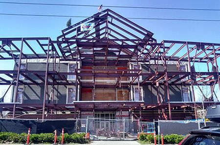 SeaPubSchools's tweet image. Ironworkers on the Coe Elementary addition project “topped out” construction—placed the final steel beam—last month. Now it’s ready for walls, windows, doors, and the building systems! Learn more: buff.ly/3x6R7t7 #SPSConnects