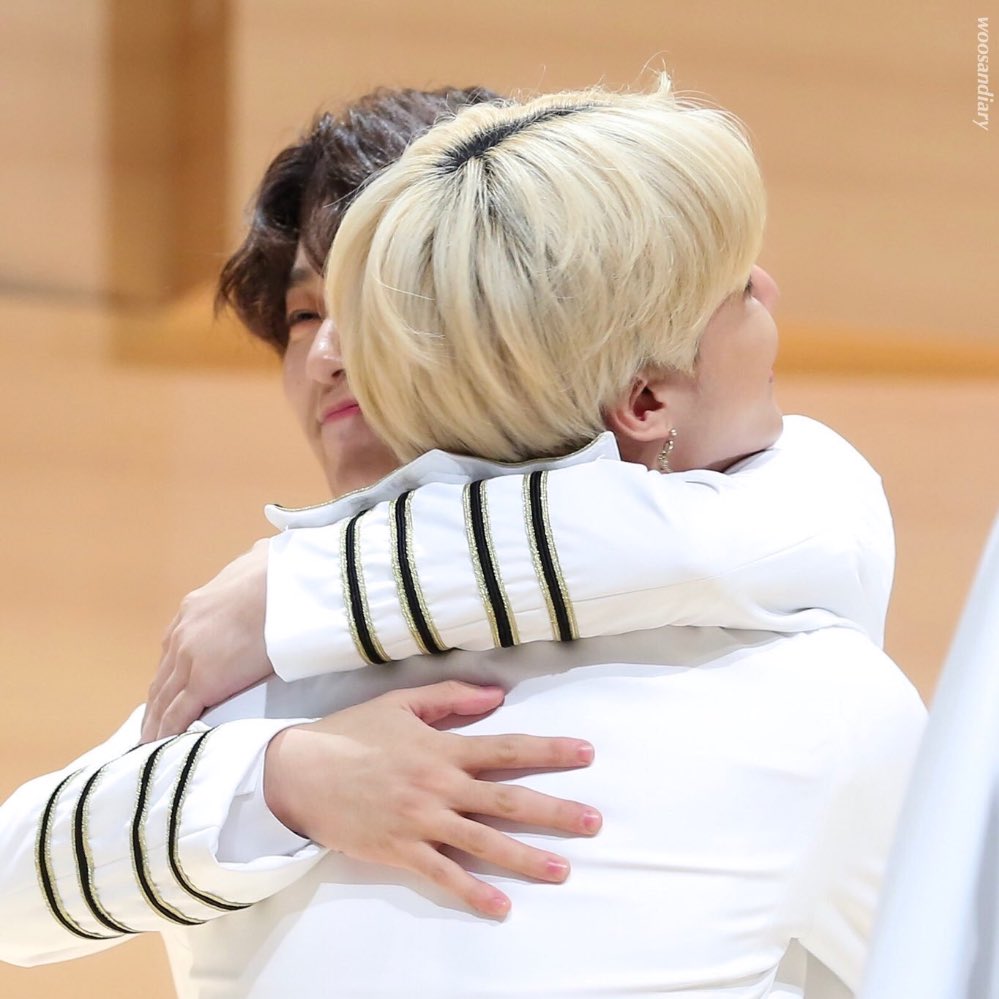 woosan hugging each other ; a thread