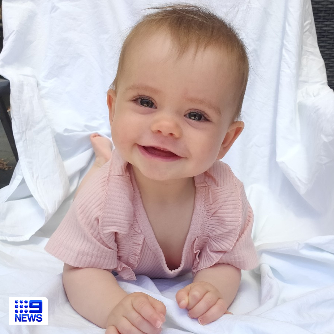 9NewsAdel's tweet photo. This is Kobi Shepherdson, the nine-month-old girl killed in the tragedy at the Whispering Wall.
Police have revealed the incident is a suspected murder-suicide, with witnesses reporting Kobi's father Henry jumped off the wall with her in a child carrier. #9News https://t.co/6lO2AaQAjn