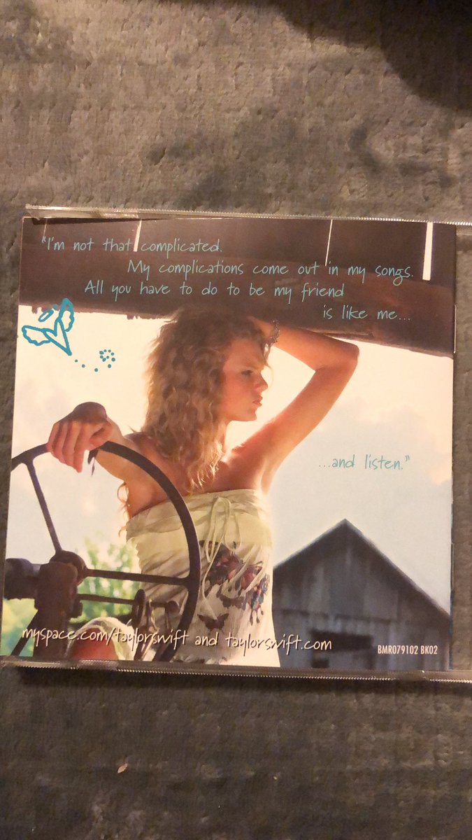 Blue writing on the back of the booklet as well