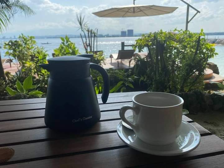 Kooyangi's coffee time and Spotify   #SentiThursday My view of Davao City  #ThrowbackThursday  #IslandGardenOfSamal