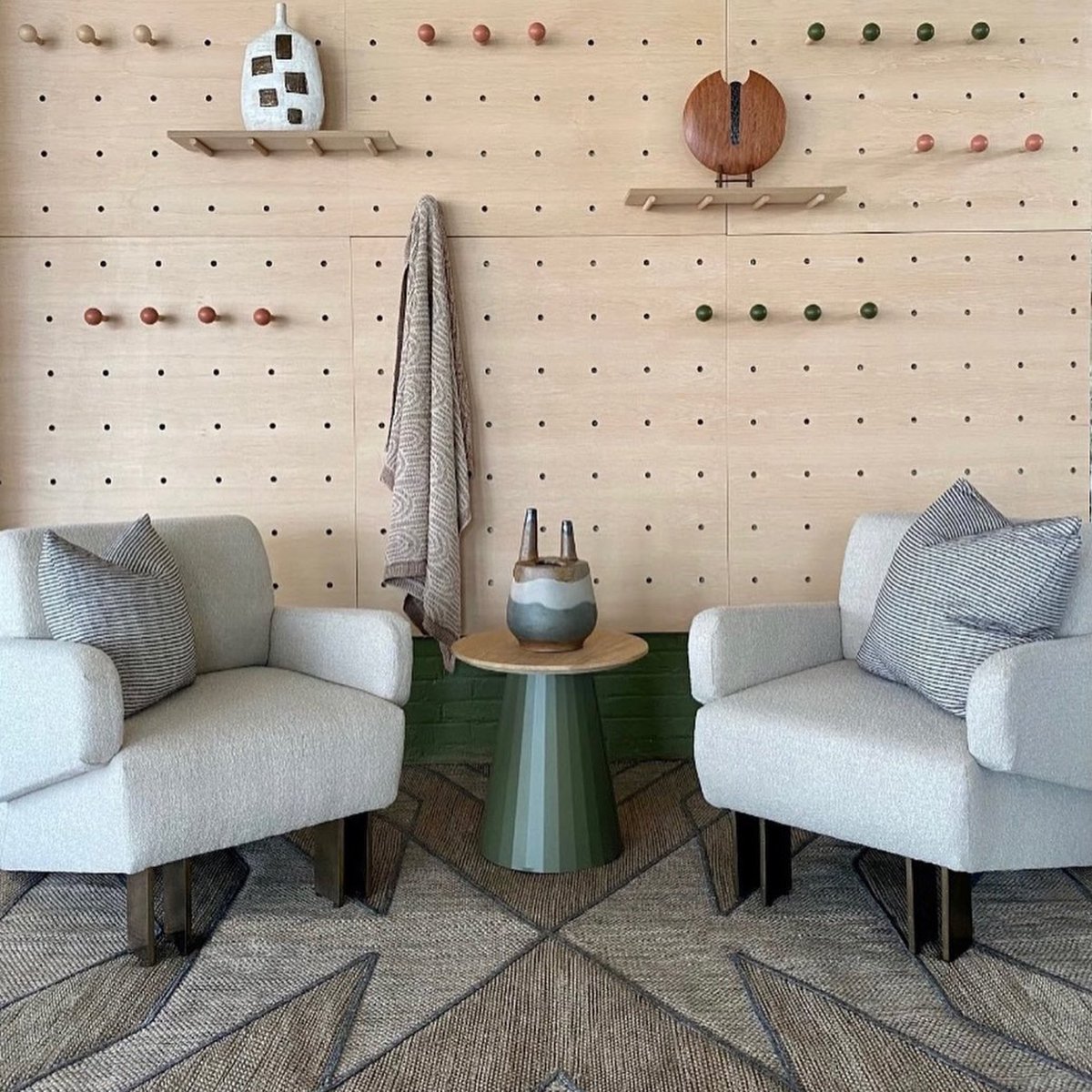 Lovely to see our pegboards in this interior design studio in Charleston- these panels are made form maple veneer with custom shelves and F&amp;B painted round pegs.