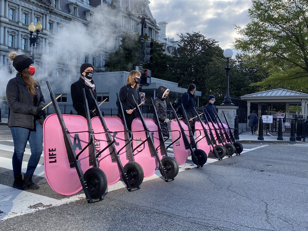 Some pics from a protest in front of the White House where climate activists have dumped cow poop to protest Biden’s “bullshit” climate plan  #EarthDay  