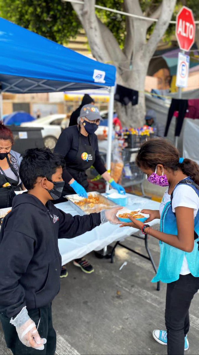 For over 2 months now, families have been living in an informal tent settlement just steps away from the US border in Tijuana, hoping they'll be allowed to submit asylum claims. We deliver healthy meals each day—yesterday WCK's Teresa served beef with rice, carrots, corn &amp; peas!