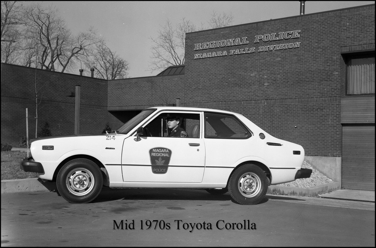 NiagRegPolice's tweet photo. #TBT Over our 50 years we have had many different vehicles in our fleet.  Here is a #Toyota in front of our former Morrison St. location in #NiagaraFalls.  Based on the size of this car it may have been an admin car?? If anyone recalls this car it would be great to learn more. https://t.co/70nSBfDOya
