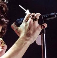 so in 2013, Harry started wearing the peace ring and he literally was not seen taking it off for over 6 years. when he did take it off because he was wearing different styles rings, he had replaced the symbol with specially colored nail polish.