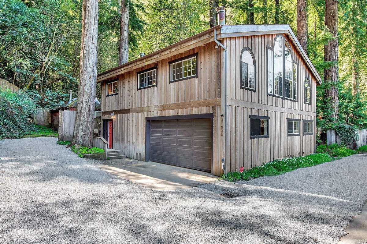 Welcome to Moon River ~ a 2,400 sf multi-level home with open wood beam ceiling and a wall of towering arched windows with views of the river &amp; beyond. 
#russianriverealestate #sonomacountyrealestate #russianriver
buff.ly/3sBTvEY