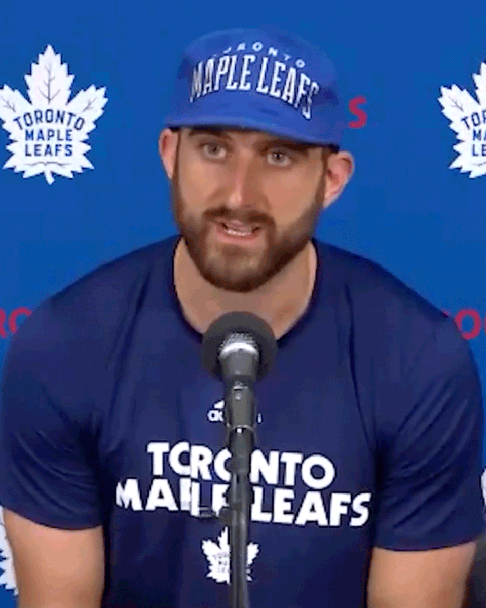 NHL's tweet photo. Talk about a first impression! 

Nick Foligno came to his debut press conference with his father's 1993 team-issued hat. 🙌

(📷 @MapleLeafs, 🏒 @NickFoligno) https://t.co/hcPQbpmcZD