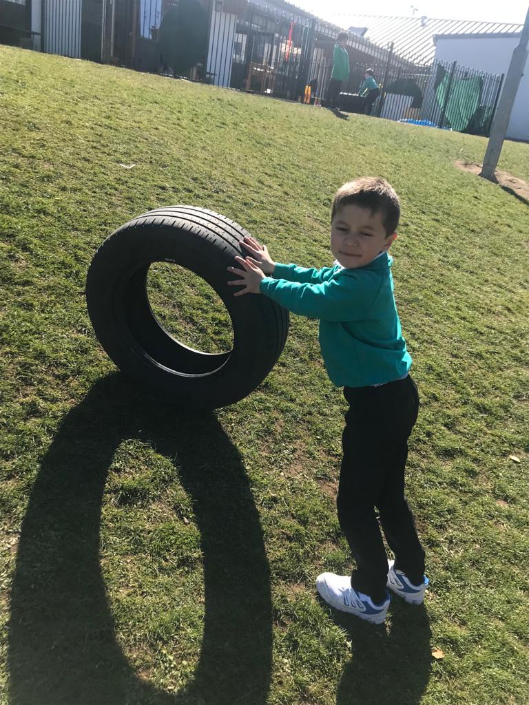 ManorParkSch's tweet photo. Fun in P1/2 today with new tyres. Some rolled, some climbed inside towers they built and some were just sitting watch the clouds and chatting. #learningmyway https://t.co/H2rF7iQ0ux