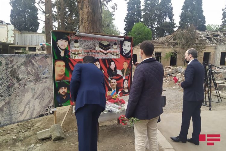 Karabakh_Humans's tweet photo. French lawyers have visited the areas in #Ganja shelled by Armenians during the #PatrioticWar. They laid flowers around the destroyed houses as a sign of respect for the memory of civilians killed during the #ArmenianTerror ... 🇦🇿🇫🇷 https://t.co/fKQc47nsWu
