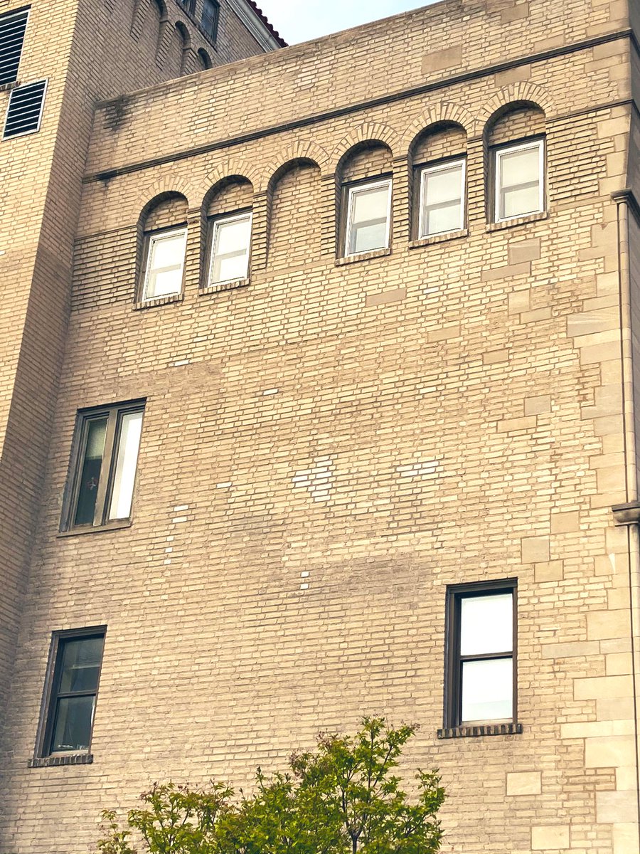 Some subtle brickwork repair in this architects & engineers building. I also really love the way the big brick right edge was visually brought into the primary side brickwork as built. Well done and good collaboration, architects and engineers!