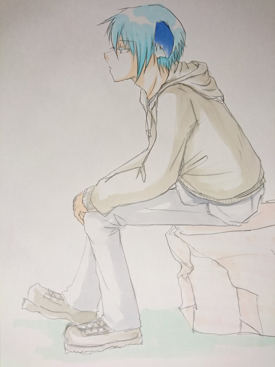 座ってる人