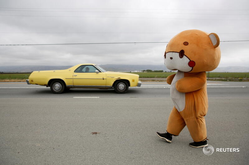 Reuters Pictures (@reuterspictures) on Twitter photo Jesse Larios, known as <a href="/iambearsun/">bearsun</a> on social media, is walking over 400 miles from his home in Los Angeles to San Francisco while wearing a self-designed bear suit to raise donations. More photos of the day: reut.rs/3vceD6l 📷 @bhoseasmall Jesse Larios, known as <a href="/iambearsun/">bearsun</a> on social media, is walking over 400 miles from his home in Los Angeles to San Francisco while wearing a self-designed bear suit to raise donations. More photos of the day: reut.rs/3vceD6l 📷 @bhoseasmall