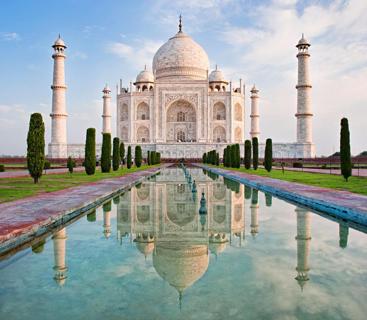Tae As Taj Mahal, India: Considered one of the most stunning piece of art, the white marble structure represents a blend of architectural styles, including Persian, Turkish and Indian. An enduring symbol of love just like our Tae is for BTS and ARMY!   #BTSARMY  @BTS_twt