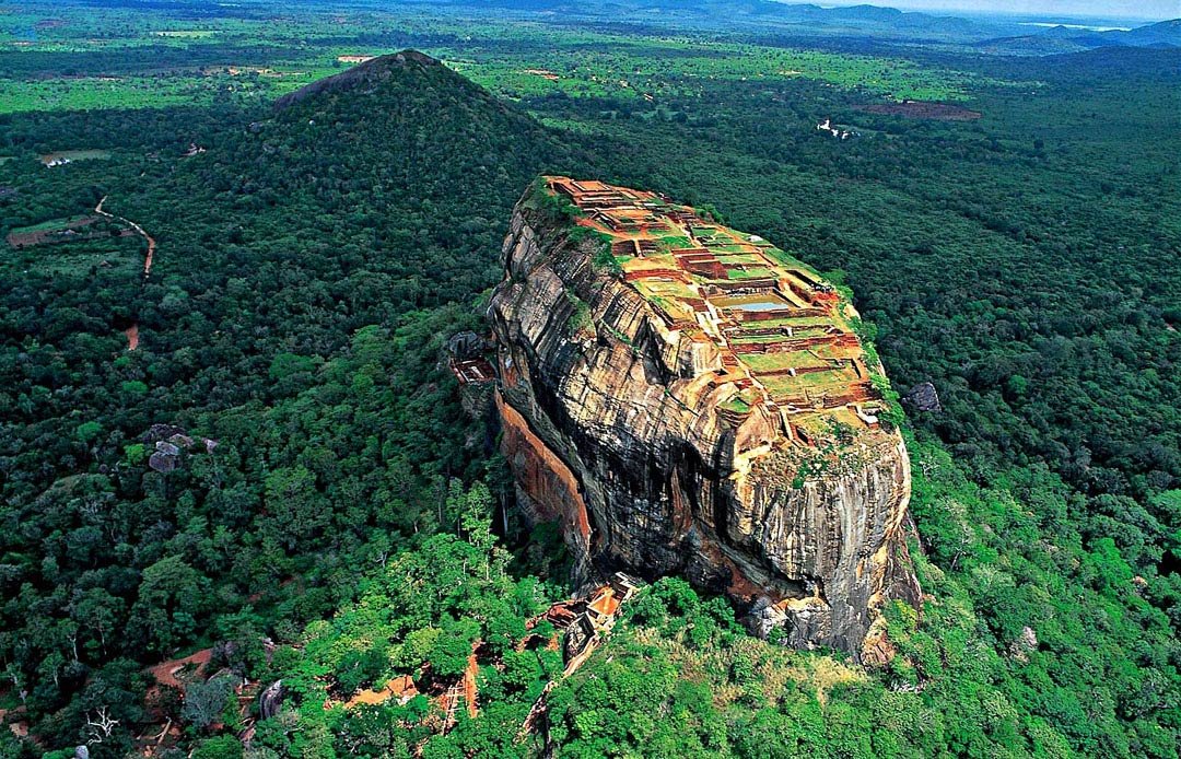  #BTSARMY as Sigiriya, Srilanka: Shaped like a lion an ancient rock fortress surrounded by the remains of extensive network of gardens, reservoirs and other structures, named 8th Wonder by UNESCO. The rock is a lava plug left over from an ancient volcano! That's ARMY!   @BTS_twt