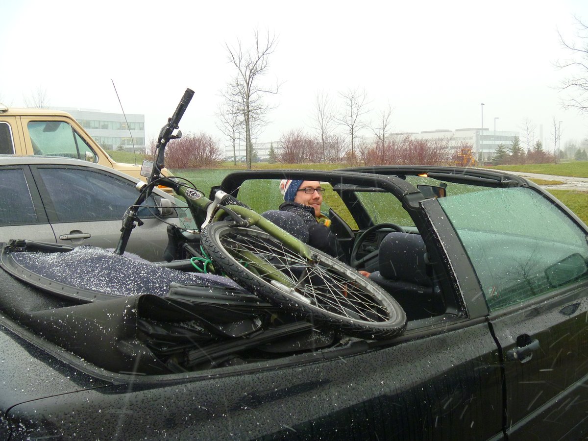 For a second co-op term, I rode my bike every day to and from work, except when this guy offered me a ride home in his convertible. (This guy is now my husband.)