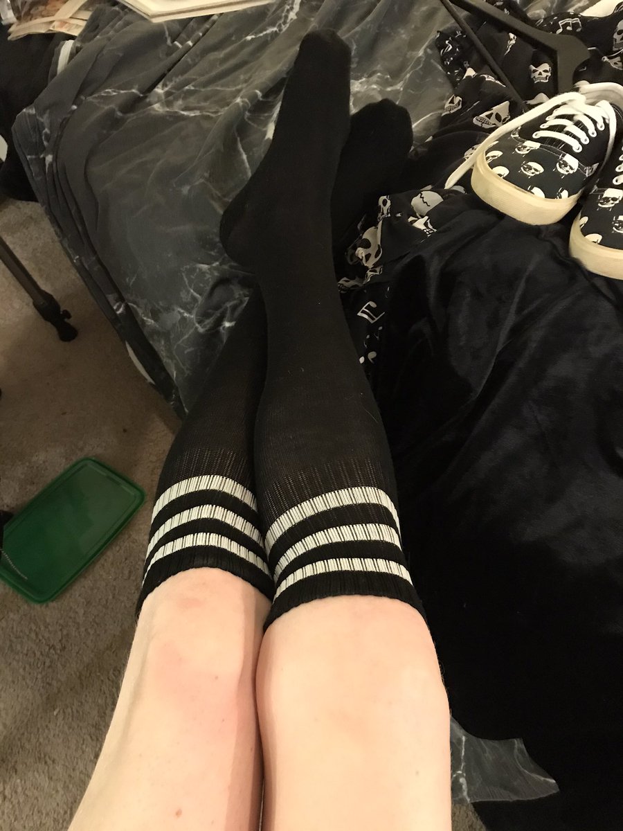 Black socks and skull shoes.