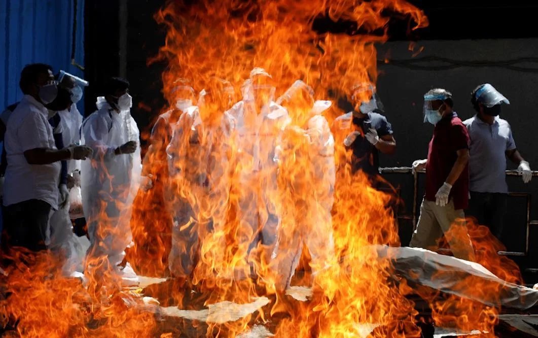 Wearing PPE at a cremation