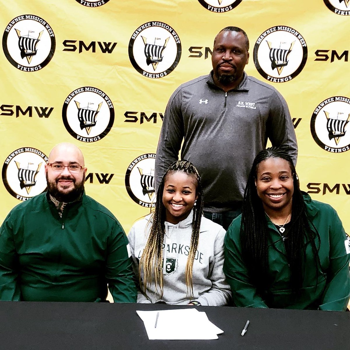 Signing Day 💚🖤 if your parents don’t embarrass u by dressing alike 4 all ur senior stuff, they’re lacking