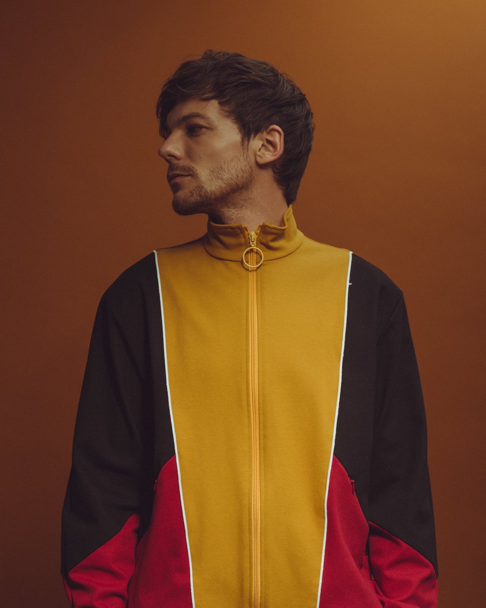 yellow louis.I vote  #Louies for  #BestFanArmy at the  #iHeartAwards