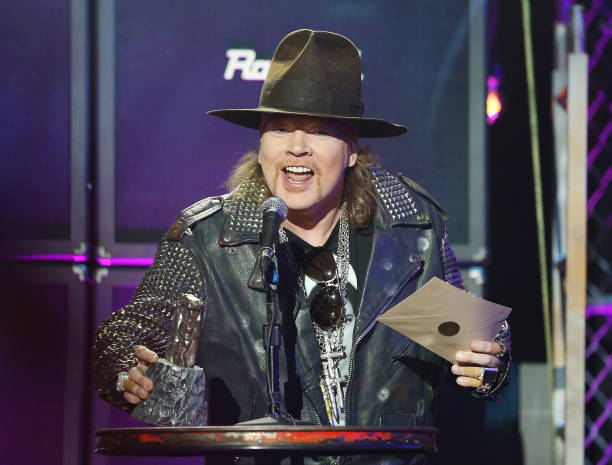 GNREveryDay's tweet photo. ‌On this day in 2014, Axl Rose received the Ronnie James Dio Lifetime Achievement Award from Nicolas Cage at the Revolver Golden Gods Awards at Club Nokia in Los Angeles, CA 🇺🇸

‌📸: Frazer Harrison, Michael Tran https://t.co/9VngKRxi4s