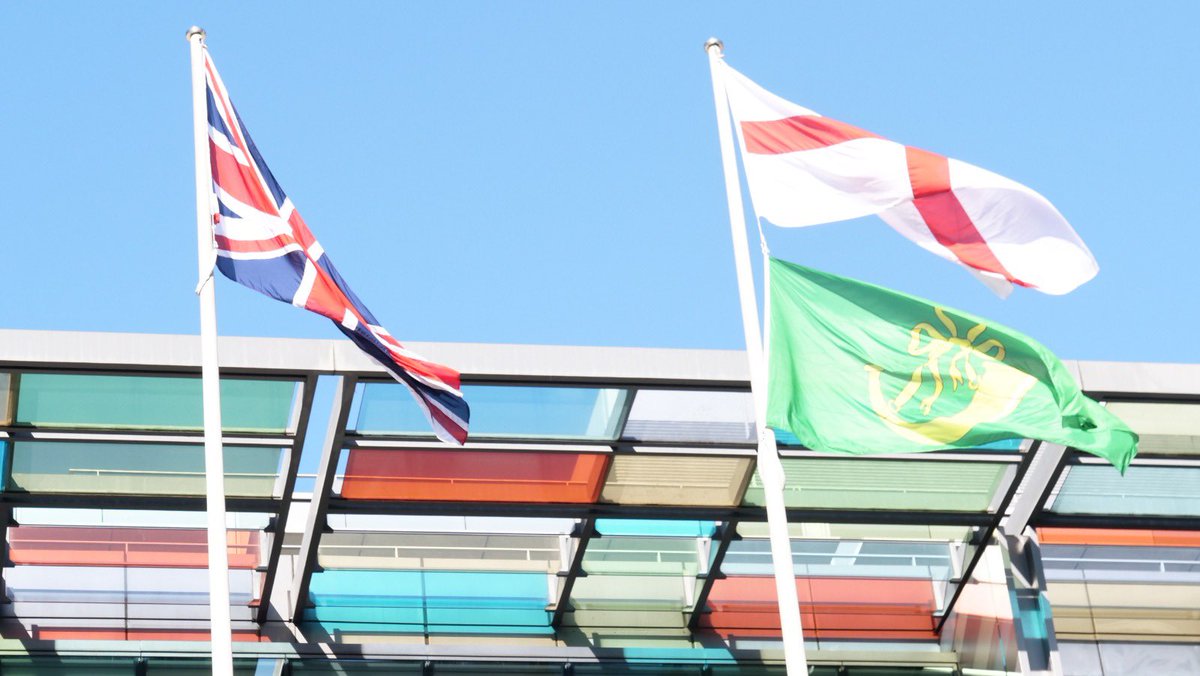 RobertJenrick's tweet photo. We’re proud to be flying the St. George’s Cross over MHCLG today, ‘double-flagging’ with Huntingdonshire, whose County Day is this weekend. #HappyStGeorgesDay https://t.co/fQNk0e2XX1